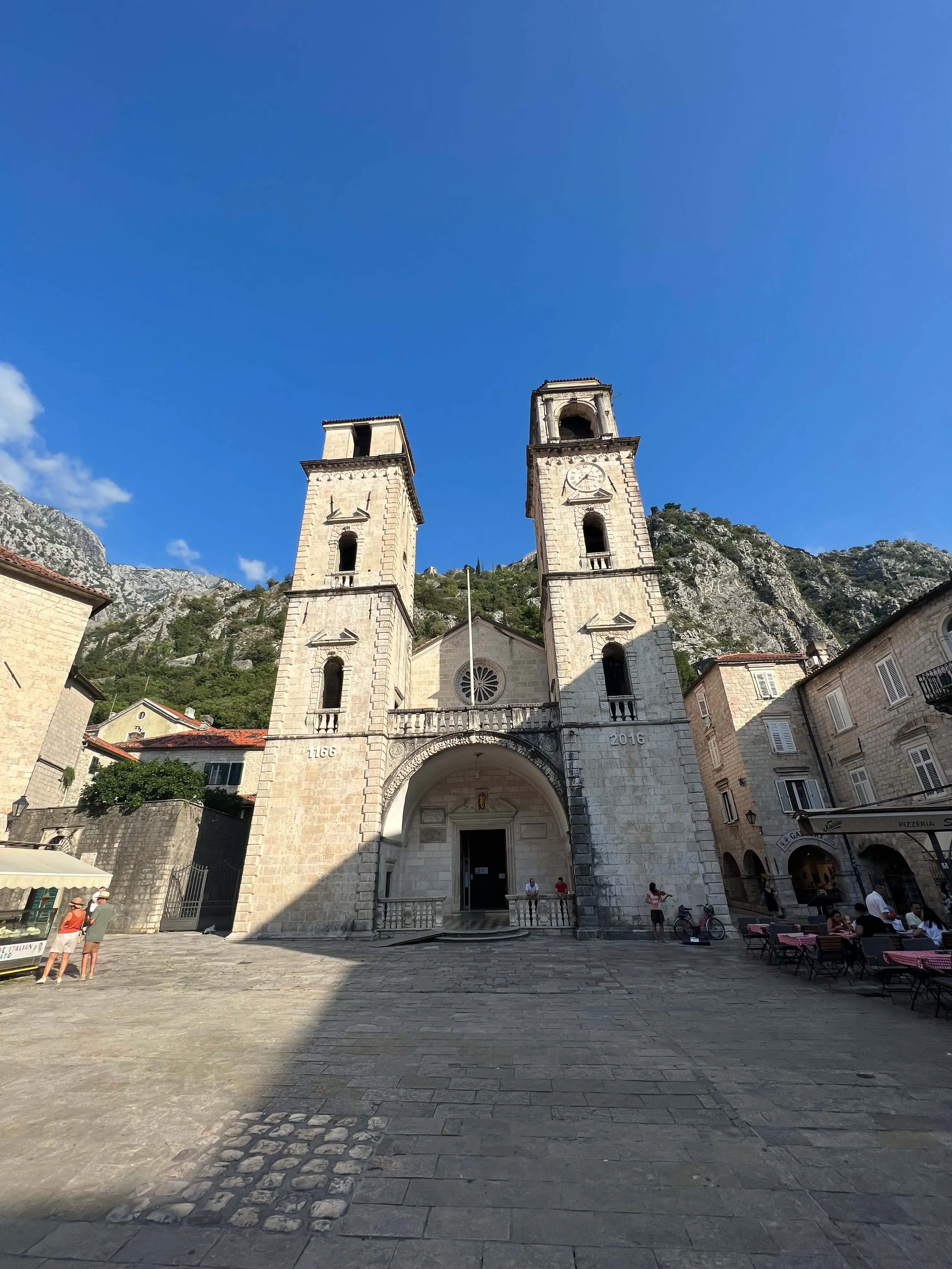 Saint Tryphon Cathedral twin bell towers on the main square in Kotor, Montenegro